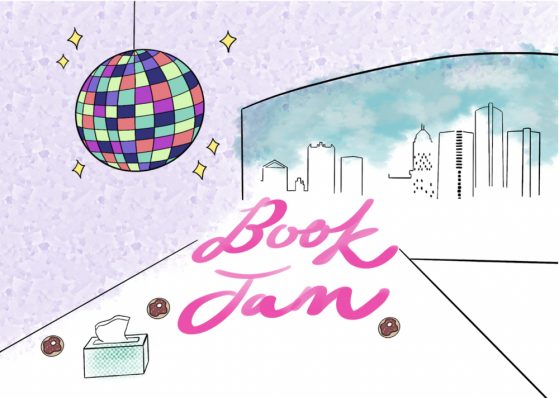ID: ‘Book Jam’ in pink cursive handwriting in the middle of long white conference table. The conference table meets the detroit skyline where there’s a huge window. On the table is a aqua Kleenex box and chocolate sprinkle donuts. Hanging above is a multicolored disco ball